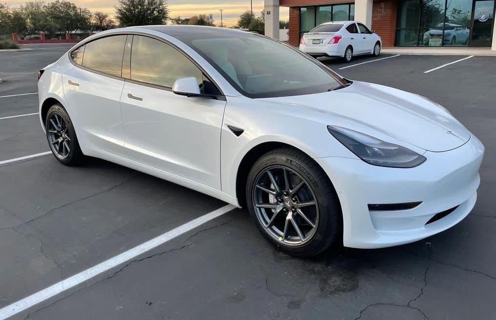 The same Tesla with the front windows freshly tinted